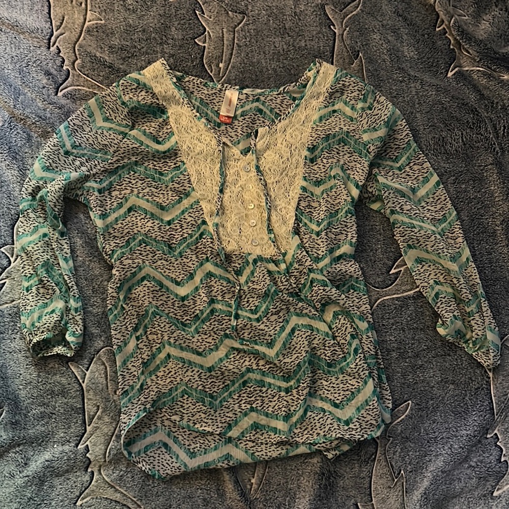 Cream and patterned see through peasant top.
